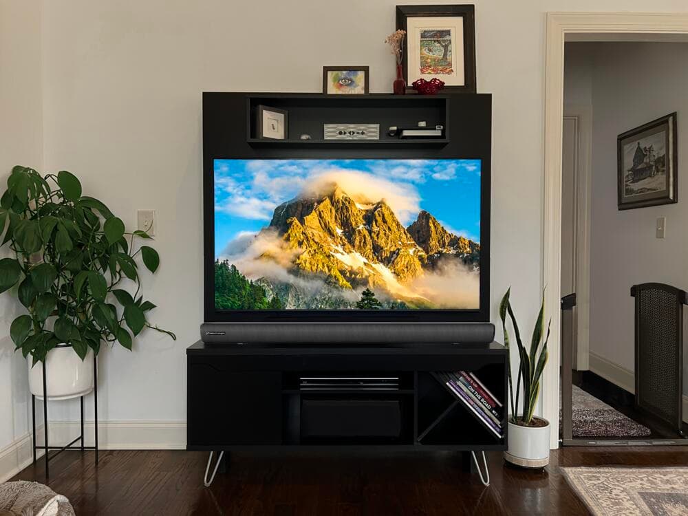 NXBAR 2.1 under a TV in a living room